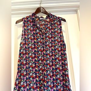 Colorful floral sleeveless top! Size: Medium. Brand new.